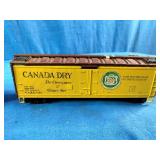 Athearn HO scale 40-foot wood refrigerator cars, likely vintage models featuring Schlitz Beer and Canada Dry Ginger Ale graphics.