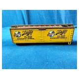 Athearn HO scale 40-foot wood refrigerator cars, likely vintage models featuring Schlitz Beer and Canada Dry Ginger Ale graphics.