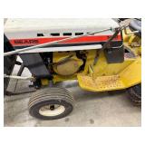 Sears 14/6 Garden Tractor With Snowblower Attachment - items in background of tractor not inc