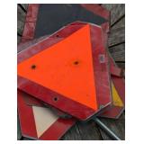 Pile of Farm Implement Caution Signs