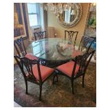 Beautifully Carved Wooden Dining Table with Winged Lion Base and Round Glass Top