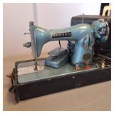 (Vintage) Modern Sewing Machine Includes foot pedal  plugged in and works
