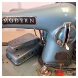 (Vintage) Modern Sewing Machine Includes foot pedal  plugged in and works