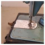 (Vintage) Modern Sewing Machine Includes foot pedal  plugged in and works