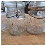Large lot of vintage Pint size Ball and Atlas canning jars