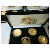 Mega Lot of Grand Casino Coins!  (9) total cases, 36 coins total