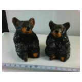 Two hand carved sitting black bears painted with gloss finish