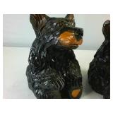 Two hand carved sitting black bears painted with gloss finish