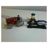 Lot of (2) Cast Iron Collectibles: Farmer on Tractor and Nutcracker