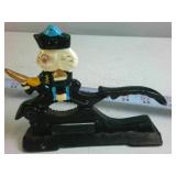 Lot of (2) Cast Iron Collectibles: Farmer on Tractor and Nutcracker