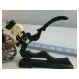 Lot of (2) Cast Iron Collectibles: Farmer on Tractor and Nutcracker