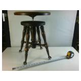 Antique Adjustable Stool made of hardwood with clawfeet
