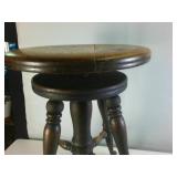 Antique Adjustable Stool made of hardwood with clawfeet
