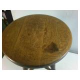 Antique Adjustable Stool made of hardwood with clawfeet