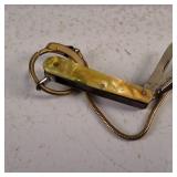 Two unique Vintage gold plated chains and a vintage folding pocket knife