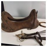 Unique Vintage Leather Saddle with hackamore and rusty shoe