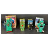 Vintage Tin Wind-Up Robots Robot With Wheels, Shooting Giant, Robby & Spark Robot (Lot of 4)