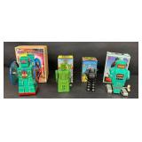 Vintage Tin Wind-Up Robots Robot With Wheels, Shooting Giant, Robby & Spark Robot (Lot of 4)
