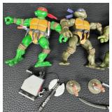 Vintage Teenage Mutant Ninja Turtles Figure Lot With Accessories (Lot of 4)