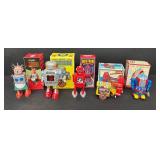 Noteworthy Lot of 5 Wind-Up Robot Mixed Lot (St. John, Neutron, Space Explorer, Mr. Atomic)