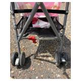 Cosco Stroller - collapsable with pink and white dots *S