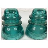 Five Hemingray No 42 Vintage Aqua-Blue Glass Insulators and One Hemingray 112 Cable Insulator