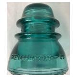 Five Hemingray No 42 Vintage Aqua-Blue Glass Insulators and One Hemingray 112 Cable Insulator