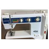 Elna Air Electronic SU Sewing Machine in Cabinet with Elna Accessory Kit