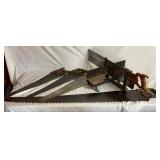 Three Antique E.C. Atkins Handsaws, 1 Disston Antique Saw, 1 Vintage 27" Disston Saw in Miter Box