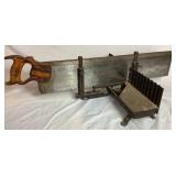 Three Antique E.C. Atkins Handsaws, 1 Disston Antique Saw, 1 Vintage 27" Disston Saw in Miter Box