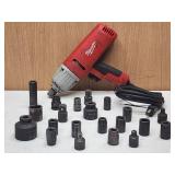 Milwaukee Electric Impact Wrench with Assorted Sockets