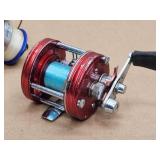 (2) Assorted Fishing Reels
