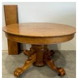 Round Oak Claw Foot Dining Table with Lion