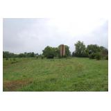 Field view toward old silo & tobacco barn