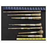 Several umbrella handles