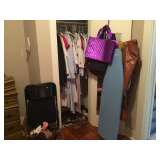 Closet, bags, ironing board