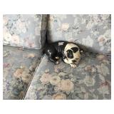 Close up of sofa/ceramic bulldog