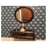 Mirror with shelf