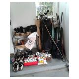 several sets of golf clubs