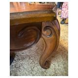Leg on coffee table