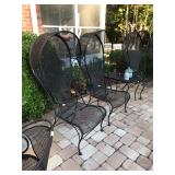 Unique Hooded metal chairs by Woodard