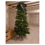 10 foot pre-lite tree with remote control. $75,00 