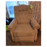 Tan Recliner rocks and swivels -$70.00