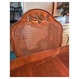 The design on the back of the chairs match the top of the Hutch