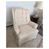 Cream swivel chair