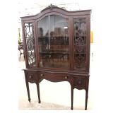  Walnut Carved China Cabinet up on Legs by “Penn House Furnishing Co.” – auction estimate $100-$300 