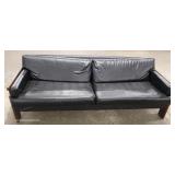  Mid Century Modern Wood Arm Black Leather Sofa by “Craft Associates Inc.” – auction estimate $300-$