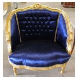  French Style Blue Upholstered Button Tufted Carved Oversized Chair – auction estimate $200-$400 