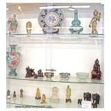 Showcase Filled with Asian Chargers, Vases, Statues, and more  Auction Estimate $50-$500 – Located 