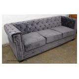 NEW Contemporary Grey Upholstered Button Tufted Sofa Auction Estimate $300-$600 – Located Inside